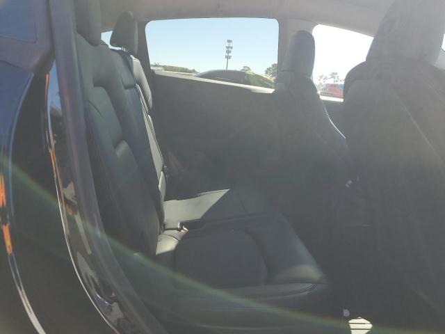 Photo 11 from auction – 2023 TESLA MODEL Y with VIN 7SAYGAEE5PF689816
