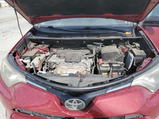 Photo 11 from auction – 2018 TOYOTA RAV4 LE with VIN 2T3BFREV3JW833773
