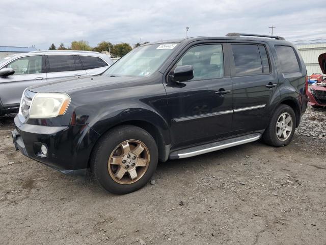 HONDA PILOT TOUR 2010 with VIN 5FNYF4H97AB024410 - Photo from auction