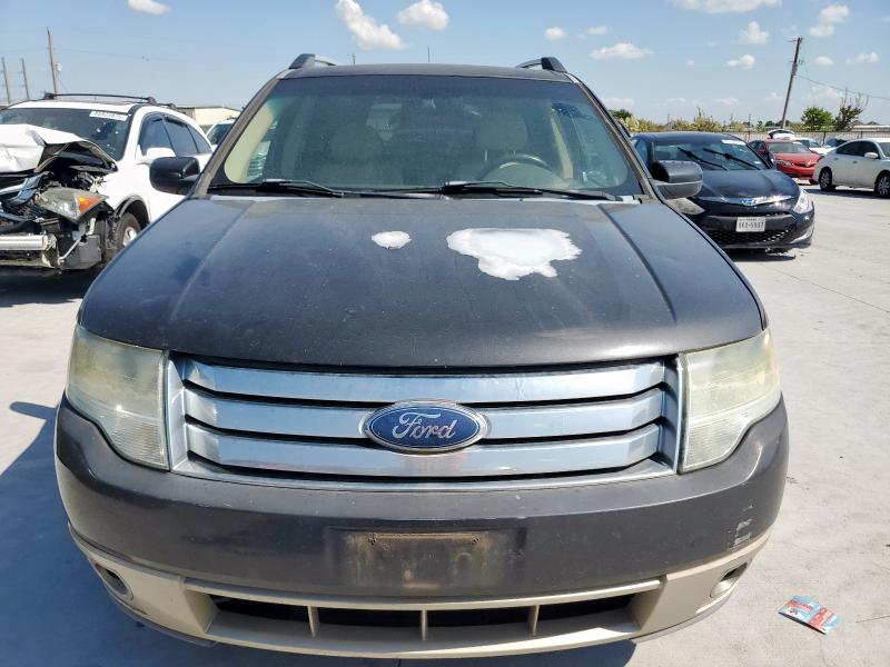 Photo 5 from auction – 2008 FORD TAURUS X E with VIN 1FMDK07W18GA28216