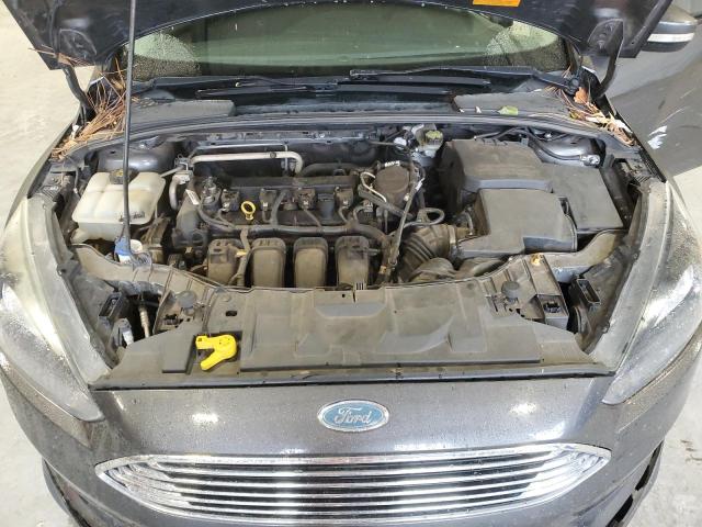 Foto 11 de la subasta – 2015 FORD FOCUS SE con VIN 1FADP3K27FL354334