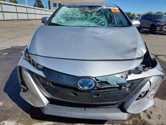 Photo 5 from auction – 2021 TOYOTA PRIUS PRIM with VIN JTDKAMFP1M3175279