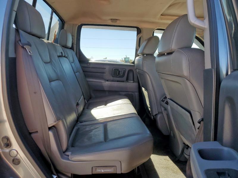 Photo 10 from auction – 2010 HONDA RIDGELINE with VIN 5FPYK1F59AB008274