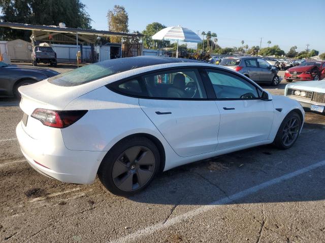 Photo 3 from auction – 2021 TESLA MODEL 3 with VIN 5YJ3E1EA6MF877024