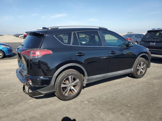 Photo 3 from auction – 2016 TOYOTA RAV4 XLE with VIN 2T3WFREV4GW258836