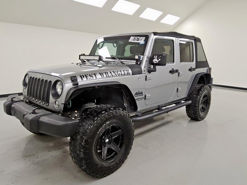 JEEP WRANGLER U 2015 with VIN 1C4BJWDG5FL571975 - Photo from auction