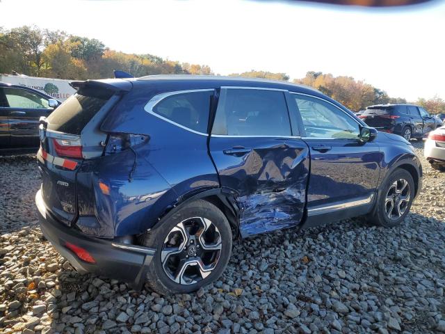 Photo 3 from auction – 2018 HONDA CR-V TOURI with VIN 7FARW2H99JE062525