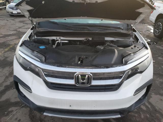 Photo 11 from auction – 2021 HONDA PILOT EXL with VIN 5FNYF6H53MB052797