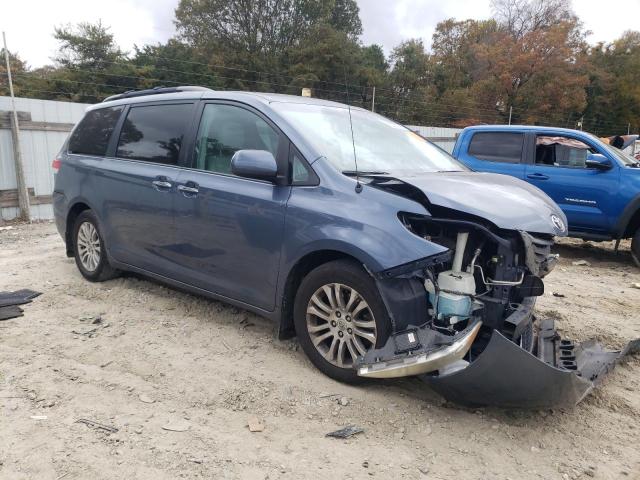 Photo 4 from auction – 2014 TOYOTA SIENNA XLE with VIN 5TDYK3DC4ES411652