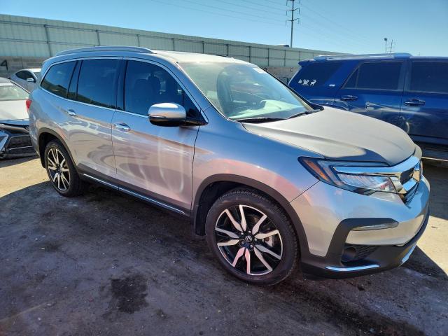 Photo 4 from auction – 2021 HONDA PILOT TOUR with VIN 5FNYF6H97MB076121