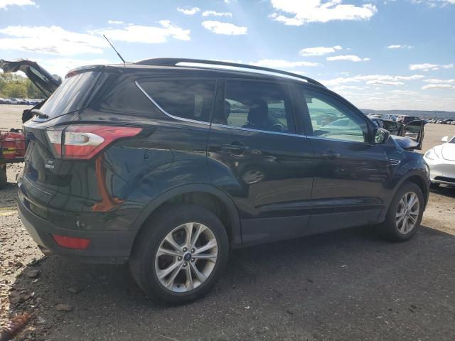 Photo 3 from auction – 2018 FORD ESCAPE SE with VIN 1FMCU9GDXJUD33617