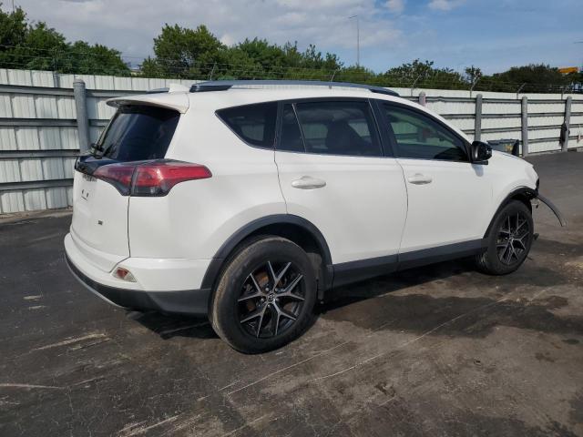 Photo 3 from auction – 2018 TOYOTA RAV4 SE with VIN JTMNFREV3JD130216