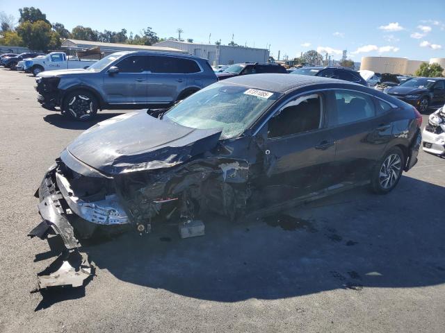 HONDA CIVIC EX 2017 with VIN 2HGFC2F86HH562097 - Photo from auction