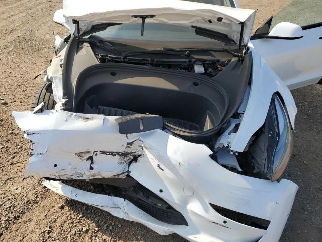 Photo 11 from auction – 2021 TESLA MODEL 3 with VIN 5YJ3E1EB7MF992742