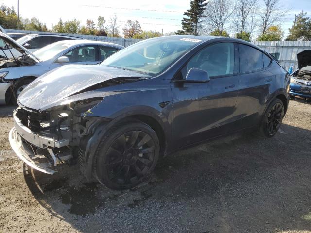 TESLA MODEL Y 2021 z numerem VIN 5YJYGAEE0MF187904 - Zdjęcie z aukcji