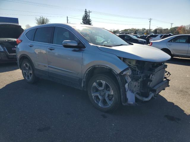 Photo 4 from auction – 2017 HONDA CR-V EX with VIN 5J6RW2H52HL012348