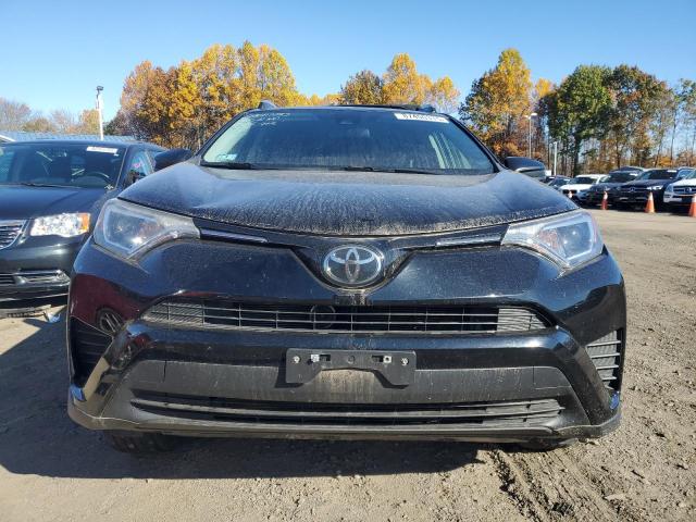 Photo 5 from auction – 2018 TOYOTA RAV4 LE with VIN 2T3BFREV8JW791150