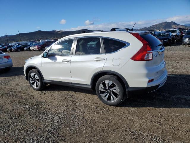 Photo 2 from auction – 2015 HONDA CR-V TOURI with VIN 5J6RM4H91FL019924