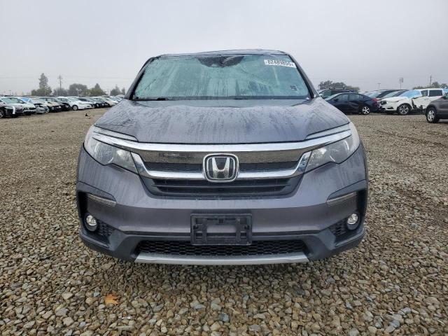 Photo 5 from auction – 2021 HONDA PILOT with VIN 5FNYF6H56MB035637