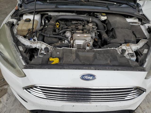 Photo 11 from auction – 2018 FORD FOCUS SE with VIN 1FADP3FE4JL324480