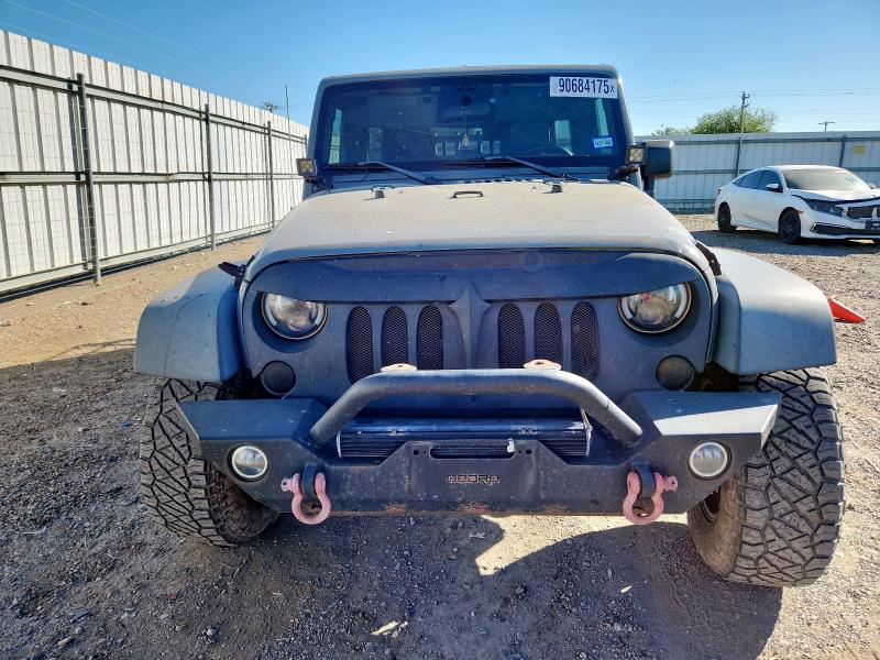 Photo 5 from auction – 2015 JEEP WRANGLER U with VIN 1C4BJWDG3FL591349