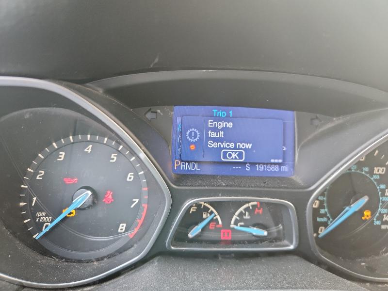Photo 9 from auction – 2014 FORD FOCUS SE with VIN 1FADP3F24EL305519