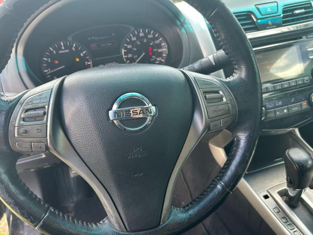 Photo 12 from auction – 2013 NISSAN ALTIMA 2.5 with VIN 1N4AL3AP9DN464167