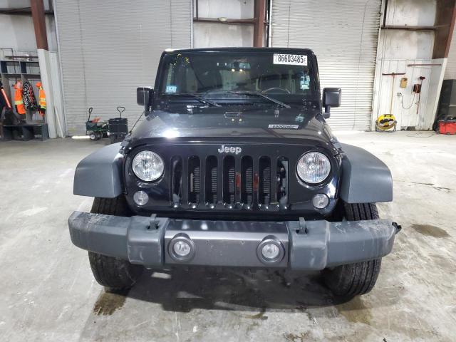 Photo 5 from auction – 2016 JEEP WRANGLER U with VIN 1C4BJWDG0GL114248