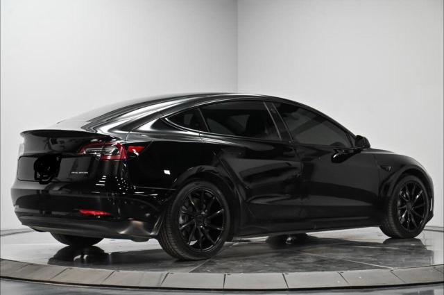 Photo 4 from auction – 2018 TESLA MODEL 3 with VIN 5YJ3E1EB5JF128896