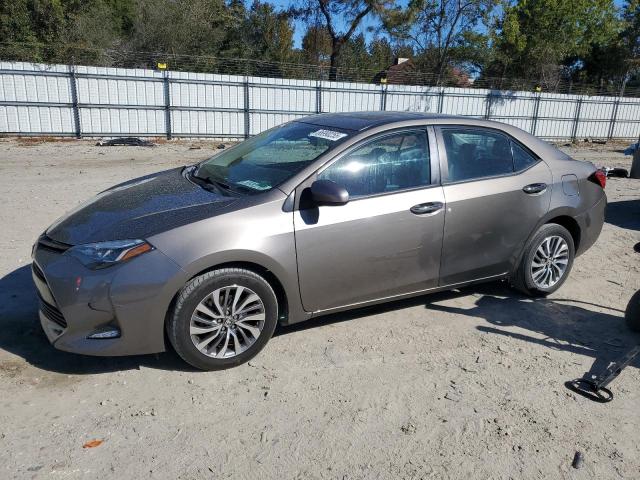 TOYOTA COROLLA L 2018 with VIN 2T1BURHEXJC099886 - Photo from auction