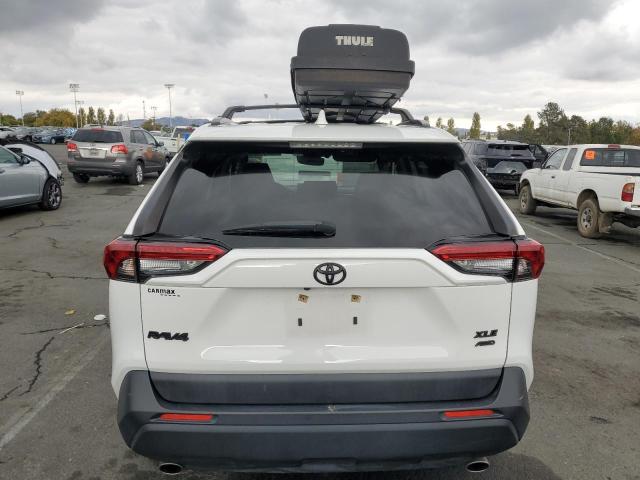 Photo 6 from auction – 2019 TOYOTA RAV4 XLE with VIN JTMP1RFV2KD029319