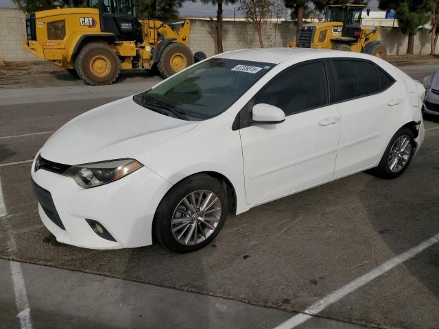TOYOTA COROLLA L 2014 with VIN 5YFBURHE0EP003995 - Photo from auction