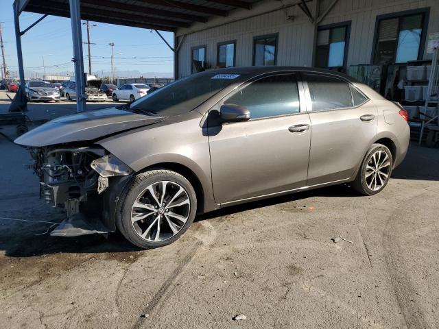 TOYOTA COROLLA L 2017 with VIN 5YFBURHE2HP716207 - Photo from auction