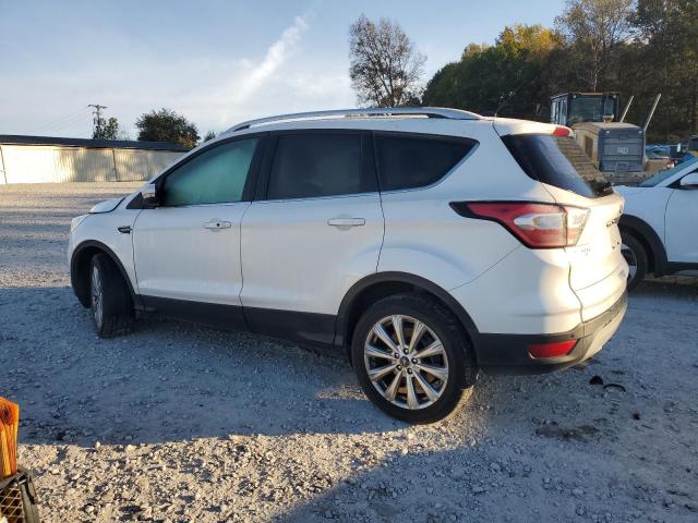 Photo 2 from auction – 2017 FORD ESCAPE TIT with VIN 1FMCU0J95HUA98652