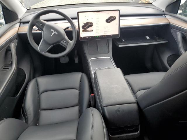 Photo 8 from auction – 2023 TESLA MODEL Y with VIN 7SAYGDEE4PA043990
