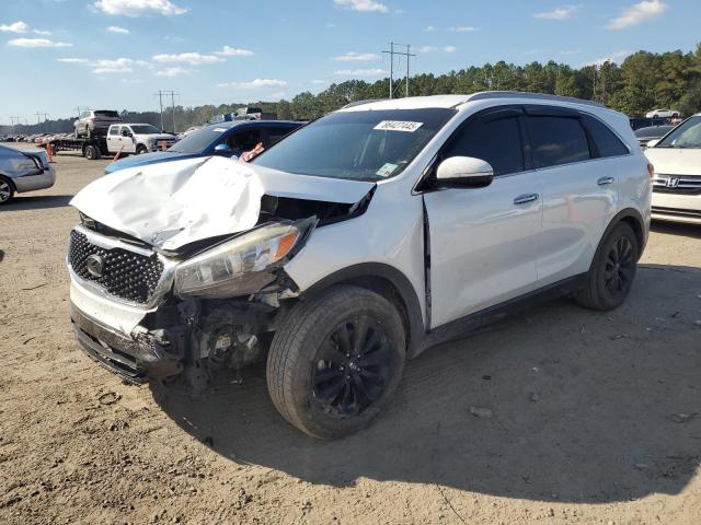 KIA SORENTO EX 2016 with VIN 5XYPH4A50GG154057 - Photo from auction