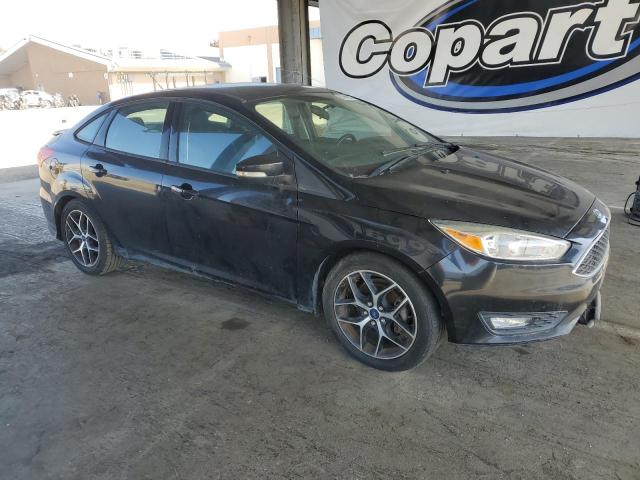 Photo 4 from auction – 2015 FORD FOCUS SE with VIN 1FADP3F27FL211278