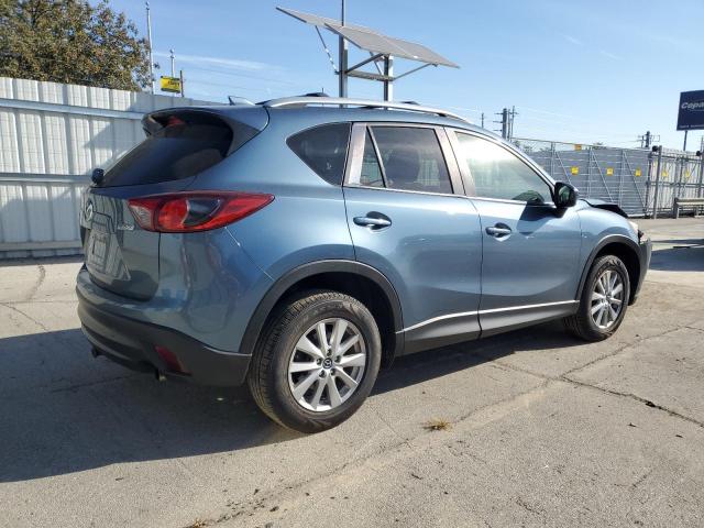 Photo 3 from auction – 2015 MAZDA CX-5 TOURING with VIN JM3KE4CYXF0435532