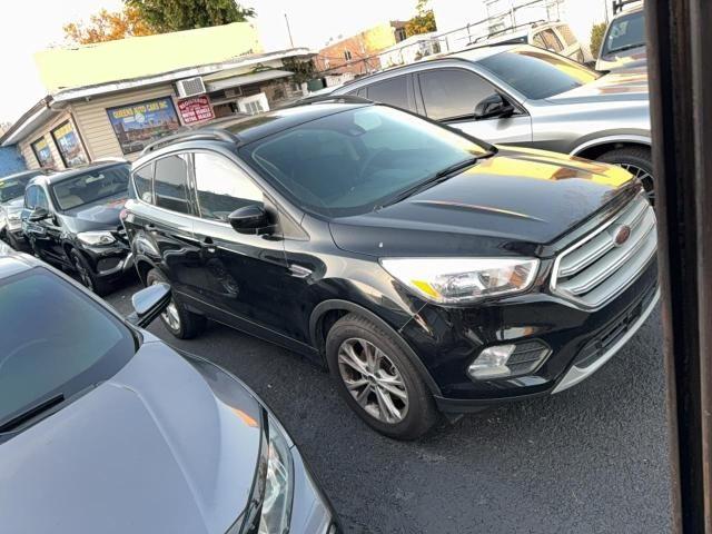 FORD ESCAPE SE 2018 with VIN 1FMCU0GD8JUA75237 - Photo from auction
