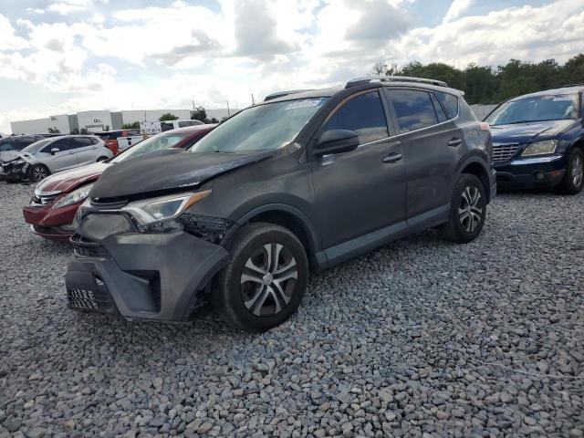 TOYOTA RAV4 LE 2018 with VIN 2T3BFREV7JW752940 - Photo from auction