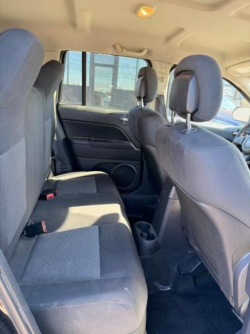 Photo 6 from auction – 2012 JEEP COMPASS with VIN 1C4NJCAB7CD672705