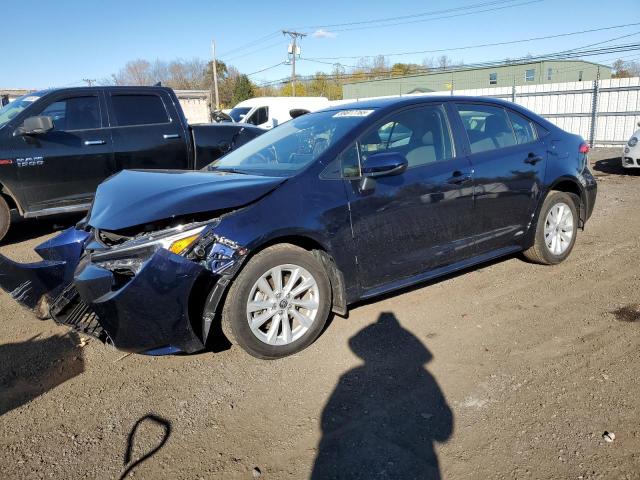 TOYOTA COROLLA LE 2025 with VIN JTDBDMHE0S3017869 - Photo from auction