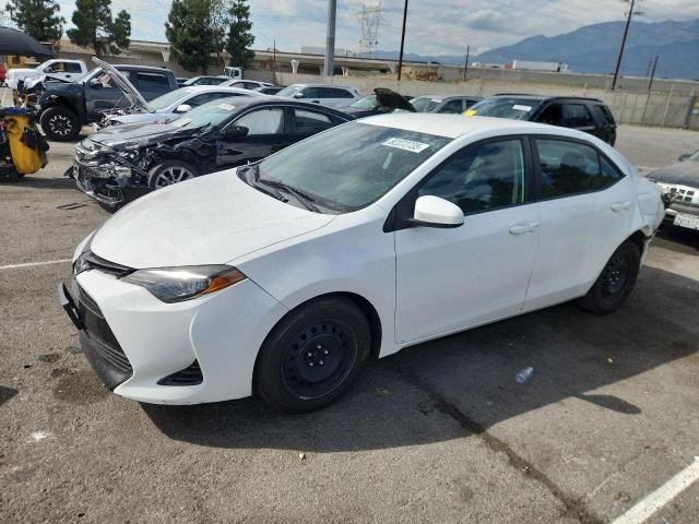 TOYOTA COROLLA L 2018 with VIN 5YFBURHE6JP854399 - Photo from auction