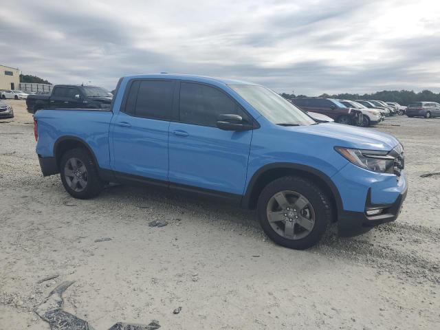 Photo 4 from auction – 2025 HONDA RIDGELINE with VIN 5FPYK3F66SB025281