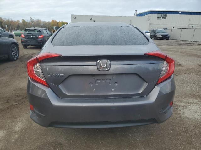 Photo 6 from auction – 2018 HONDA CIVIC EX with VIN 2HGFC2F81JH022663