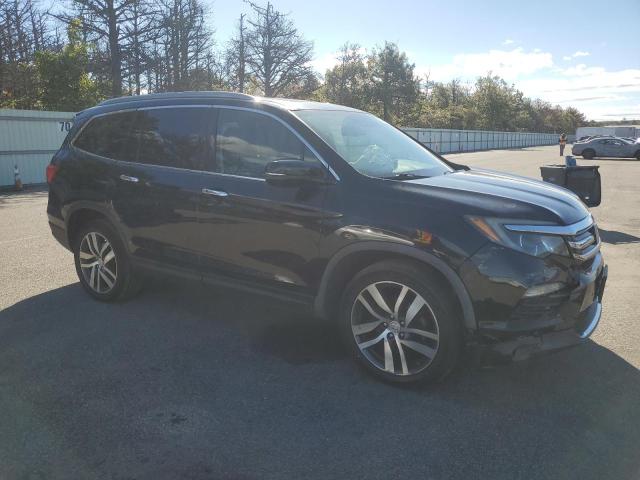 Photo 4 from auction – 2016 HONDA PILOT ELIT with VIN 5FNYF6H03GB023891