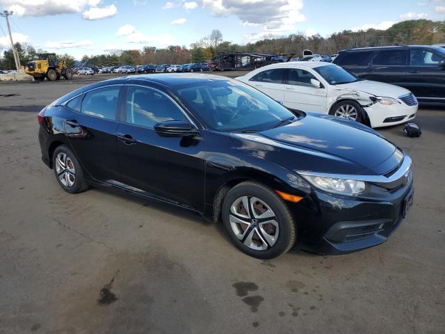 Photo 4 from auction – 2017 HONDA CIVIC LX with VIN 2HGFC2F54HH563206