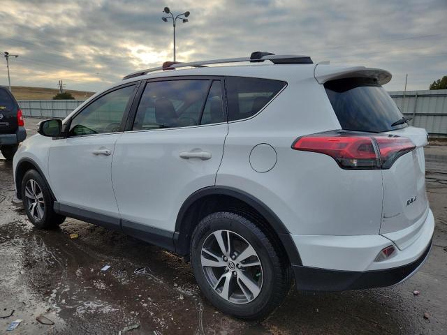 Photo 2 from auction – 2017 TOYOTA RAV4 XLE with VIN JTMRFREV7HD200876