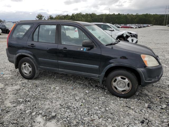 Photo 4 from auction – 2002 HONDA CR-V LX with VIN JHLRD68402C025622