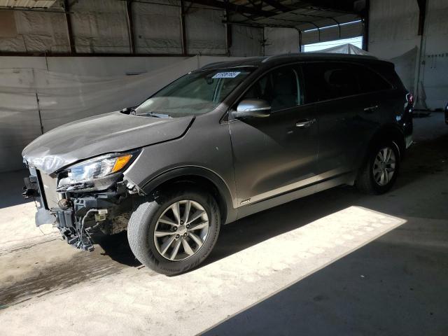 KIA SORENTO LX 2016 with VIN 5XYPGDA39GG136450 - Photo from auction